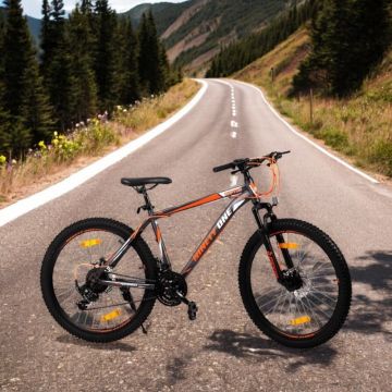 Bicicleta mtb 26 inch, schimbator shimano cu 21 viteze, suspensii fata, cadru otel, jante aluminiu, negru-portocaliu Bicicleta mtb 26 inch, schimbator shimano cu 21 viteze, suspensii fata, cadru otel, jante aluminiu, negru-portocaliu